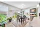 Cozy dining area with a table, chairs, and windows offering natural light and outdoor views at 963 Booneway Ln, Bargersville, IN 46106