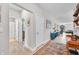 Spacious hallway with hardwood floors, connecting various rooms in this lovely home at 963 Booneway Ln, Bargersville, IN 46106