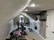 Attic gym with skylights, exercise equipment, and neutral walls at 10 Sara Ct, Whiteland, IN 46184