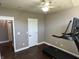 Home gym featuring a modern treadmill and white-trim doors at 10 Sara Ct, Whiteland, IN 46184