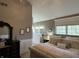 Spacious main bedroom with a double vanity, dresser, and a large, comfortable bed at 10 Sara Ct, Whiteland, IN 46184
