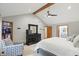 Bright main bedroom features a vaulted ceiling and access to walk-in closet and an en-suite bathroom at 10418 Forest Creek Dr, Indianapolis, IN 46239