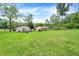 A large backyard with an outbuilding and room to entertain at 10972 W Old Nashville Rd, Columbus, IN 47201