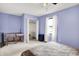 Bedroom with a closet and built-in shelving and carpeted floors at 10972 W Old Nashville Rd, Columbus, IN 47201