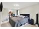 Bedroom with closet, bedside tables, and a cozy bed, creating a relaxing atmosphere at 10972 W Old Nashville Rd, Columbus, IN 47201