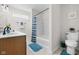 Bright bathroom features a white vanity, toilet, tub and a shower with neutral paint at 11209 Black Gold Dr, Noblesville, IN 46060