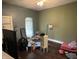 Bedroom featuring hardwood floors, a window with blinds, and a ceiling fan at 1164 Groff Ave, Indianapolis, IN 46222