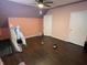 A bedroom featuring hardwood floors, natural light, and neutral-colored walls at 1164 Groff Ave, Indianapolis, IN 46222
