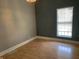 Bedroom with neutral walls and a window for natural light at 1164 Groff Ave, Indianapolis, IN 46222