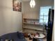 Bedroom featuring laminate floors and a window allowing natural light at 1164 Groff Ave, Indianapolis, IN 46222