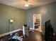 Living room featuring dark stained hardwood floors and natural light at 1164 Groff Ave, Indianapolis, IN 46222