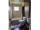 Bathroom featuring toilet, sink and shower-tub combo at 1168 N Gladstone Ave, Indianapolis, IN 46201