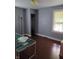Bedroom with wood floors and storage at 1168 N Gladstone Ave, Indianapolis, IN 46201