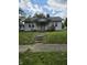 Quaint single-story house with a small front porch and a grassy front yard at 1168 N Gladstone Ave, Indianapolis, IN 46201