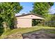 Carport with a gravel driveway, offering convenient covered parking and outdoor space at 1170 N Concord St, Indianapolis, IN 46222