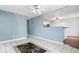 Open-concept living and kitchen area with tile and hardwood floors, great for entertaining guests at 1170 N Concord St, Indianapolis, IN 46222