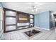 Bright living room with custom built-in shelving and decorative tile accents at 1170 N Concord St, Indianapolis, IN 46222