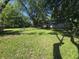 Wide backyard with gazebo, fire pit and partially shaded lawn, ideal for outdoor enjoyment at 1263 Barefoot Trl, Greenwood, IN 46142