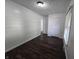 This bedroom features hardwood floors, closet, and neutral walls at 1263 Barefoot Trl, Greenwood, IN 46142