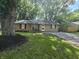 Charming home with well-maintained lawn, inviting entrance, and gravel driveway at 1263 Barefoot Trl, Greenwood, IN 46142