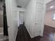 This hallway features hardwood floors and neutral walls at 1263 Barefoot Trl, Greenwood, IN 46142