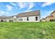 Expansive backyard featuring a well-maintained lawn, perfect for outdoor activities and relaxation at 1334 Sunnybrook Ln, Greenwood, IN 46143