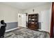 Cozy bedroom featuring classic wooden furniture, neutral walls, and decorative accents and doorway at 1334 Sunnybrook Ln, Greenwood, IN 46143