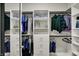 Walk-in closet with custom shelving and ample storage space at 1334 Sunnybrook Ln, Greenwood, IN 46143