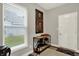Inviting foyer with natural light, console table, and neutral decor at 1334 Sunnybrook Ln, Greenwood, IN 46143