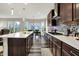 Modern kitchen featuring stainless steel appliances and a center island with barstool seating at 1334 Sunnybrook Ln, Greenwood, IN 46143