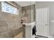 Updated shower with decorative window, glass partition, and rain shower head at 1334 Sunnybrook Ln, Greenwood, IN 46143