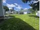 The backyard is spacious and flat, with an oversized garage and room for activities at 144 S 7Th Ave, Beech Grove, IN 46107