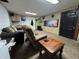 Finished basement with a couch, recliner, and TV at 144 S 7Th Ave, Beech Grove, IN 46107