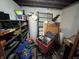 Unfinished basement with water heater, exposed rafters, and storage throughout at 144 S 7Th Ave, Beech Grove, IN 46107
