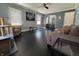 Cozy living room with a ceiling fan, artwork and unique furniture at 144 S 7Th Ave, Beech Grove, IN 46107
