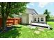 Lush backyard featuring a shed, patio, fenced-in yard, and mature trees with ample space at 16857 Palmetto Way, Noblesville, IN 46062