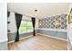 Sunlit bedroom featuring designer paint and a large window at 16857 Palmetto Way, Noblesville, IN 46062