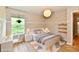 Charming bedroom featuring a bed with stylish decor, a desk, and a bright window with outdoor views at 16857 Palmetto Way, Noblesville, IN 46062