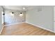 Bedroom with painted brick wall, ceiling fan and hardwood flooring at 16857 Palmetto Way, Noblesville, IN 46062