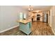 Bright kitchen with white cabinetry, butcher block counters, stainless steel appliances, and a center island at 16857 Palmetto Way, Noblesville, IN 46062