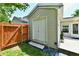 A fenced in backyard featuring a shed, patio, and lush green grass at 16857 Palmetto Way, Noblesville, IN 46062