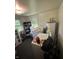 Functional laundry room with washer, dryer, and storage space at 1801 E 16Th St, Muncie, IN 47302