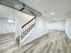Finished basement offers ample space with durable flooring and bright lighting at 1920 E Epler E Ave, Indianapolis, IN 46227