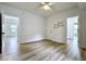 Bright, open bedroom featuring new floors and multiple doorways at 1920 E Epler E Ave, Indianapolis, IN 46227