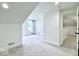 Carpeted bedroom with dormer and an open door to another room at 1920 E Epler E Ave, Indianapolis, IN 46227