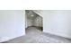 Neutral carpeted bedroom with view into another room at 1920 E Epler E Ave, Indianapolis, IN 46227