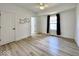 Spacious bedroom featuring light floors, white trim, and ceiling fan at 1920 E Epler E Ave, Indianapolis, IN 46227