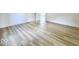 Spacious bedroom featuring new light floors and white trim at 1920 E Epler E Ave, Indianapolis, IN 46227