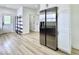 Kitchen area featuring stainless steel refrigerator, wood-look floors and ample white cabinets at 1920 E Epler E Ave, Indianapolis, IN 46227