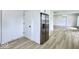 Open-concept living area featuring luxury vinyl flooring and neutral color scheme at 1920 E Epler E Ave, Indianapolis, IN 46227